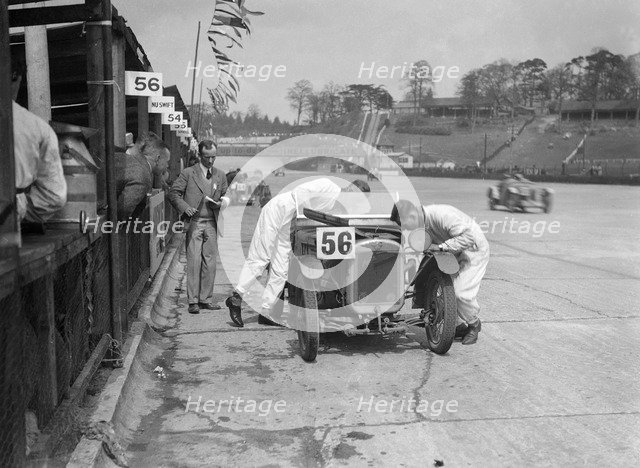 J Reeves and HHB Beacon's Austin Ulster at the JCC Double Twelve race, Brooklands, 8/9 May 1931. Artist: Bill Brunell.