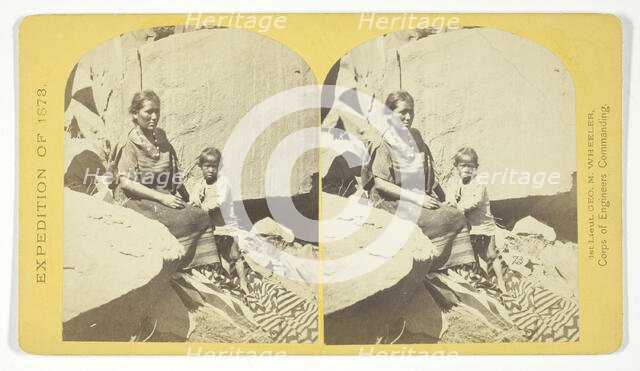 Navajo Indian Squaw, and Child, at their home, in Cañon de Chelle, 1873. Creator: Tim O'Sullivan.