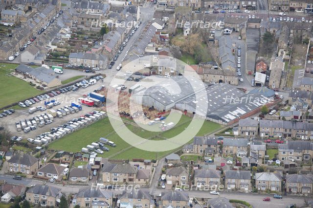 Cattle auction in progress at Barnard Castle Auction Mart, County Durham, 2016. Creator: Matthew Oakey.