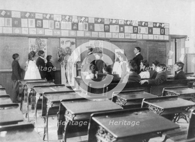 United States Indian School, Carlisle, Pa.: Class studying anatomy, 1901. Creator: Frances Benjamin Johnston.