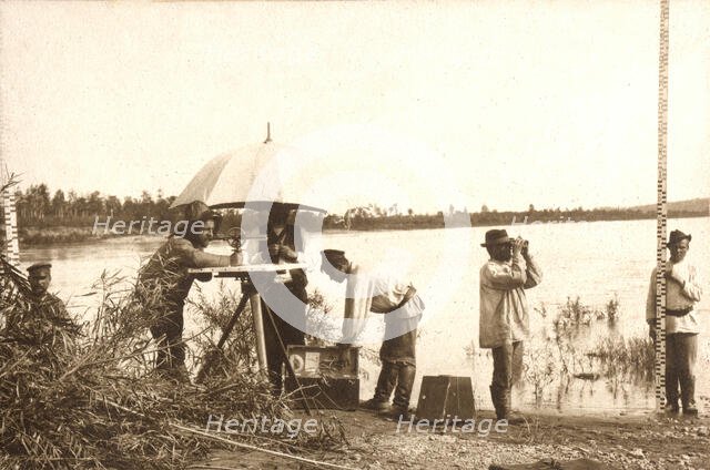 Carrying out a scale survey on the banks of the Zeya River, 1909. Creator: Vladimir Ivanovich Fedorov.