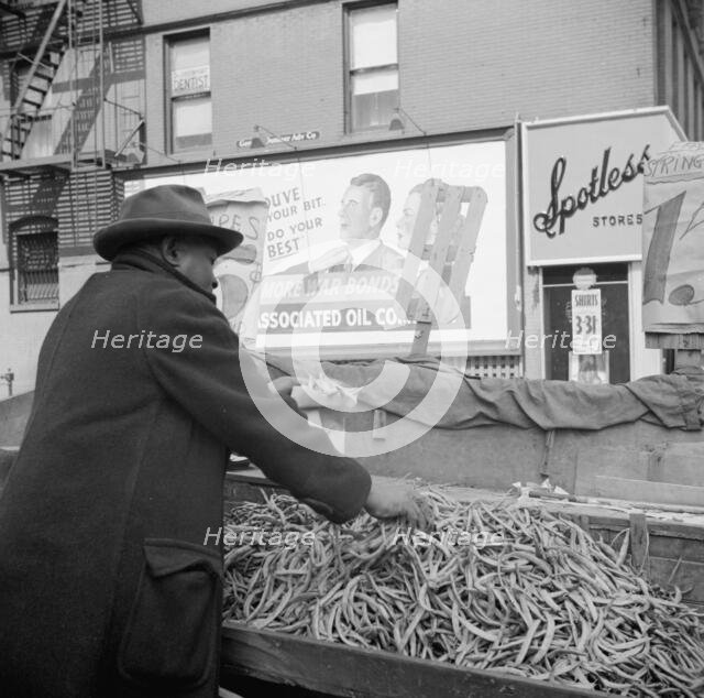 Street peddler in the Harlem section, New York, 1943. Creator: Gordon Parks.