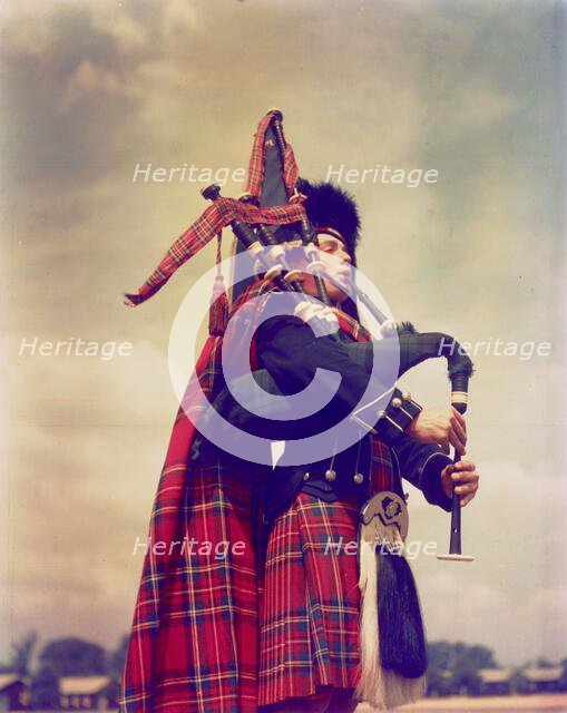 Piper, Scotland, c1955. Creator: Arthur Charles Kirby Ware.