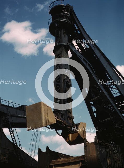Pennsylvania R.R. ore docks, a "Hulett" unloader in operation, Cleveland, Ohio, 1943. Creator: Jack Delano.