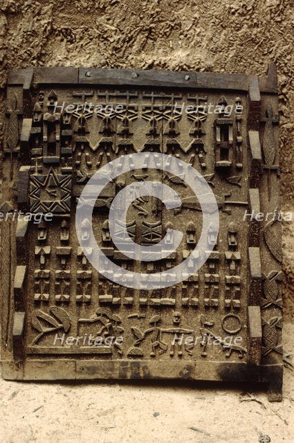 Carved wooden door, Pays Dogon, Mali, 1990. Creator: Amanda Waite.