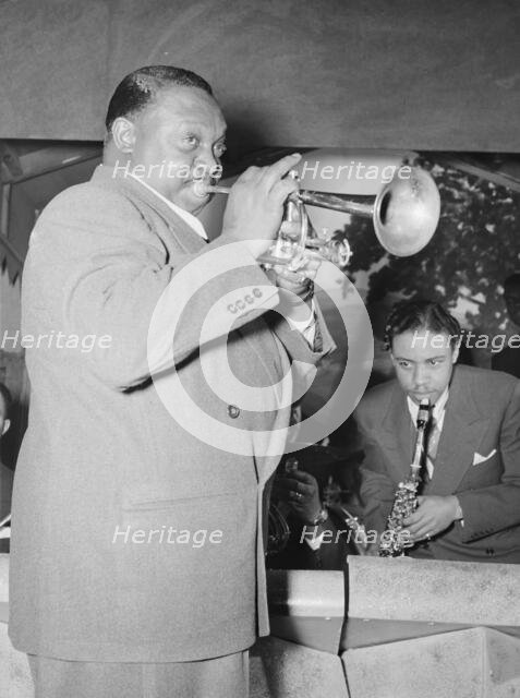 Portrait of Rex William Stewart, Aquarium(?), New York, N.Y., ca. June 1946. Creator: William Paul Gottlieb.