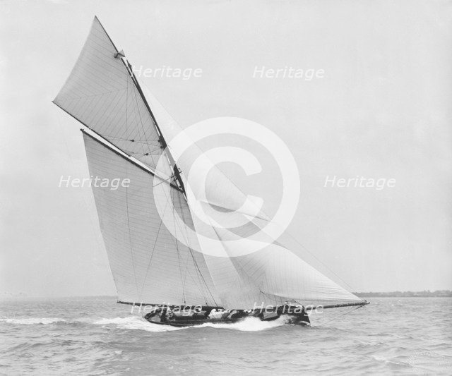The gaff rigged cutter 'Bloodhound' sailing close-hauled. Creator: Kirk & Sons of Cowes.