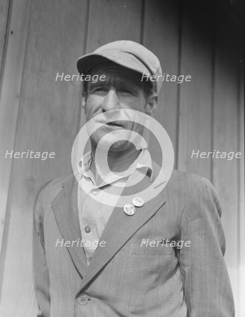 Ex-Oklahoma farmer, one of the leaders in the strike of cotton pickers, Kern County, CA, 1938. Creator: Dorothea Lange.