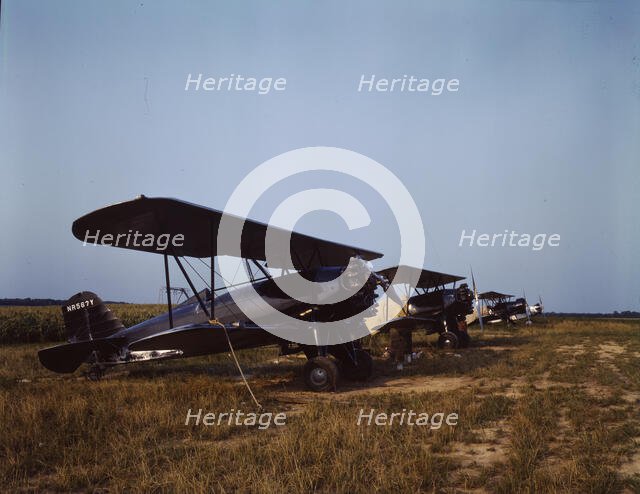 Low flying planes from which dust or insecticide is spread..., Seabrook Farm, Bridgeton, N.J., 1942. Creator: John Collier.