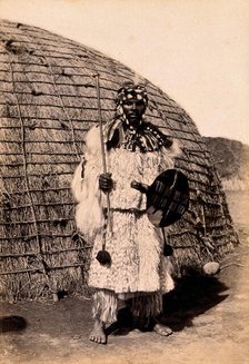 South Africa: an African chief in a dress of angora goatskin, 19th century. Creator: Unknown.