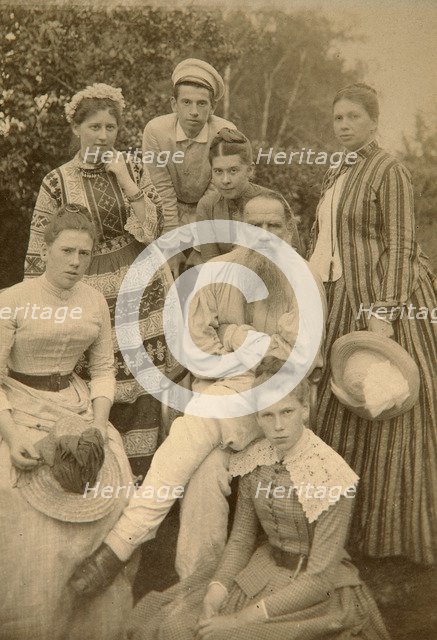 Russian author Leo Tolstoy with his family, Yasnaya Polyana, Russia, late 19th century(?).  Artist: Semyon Abamalek-Lazarev
