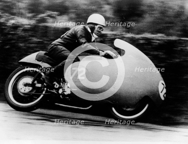 Possibly Bill Lomas, on a Moto Guzzi V8, 1957. Artist: Unknown