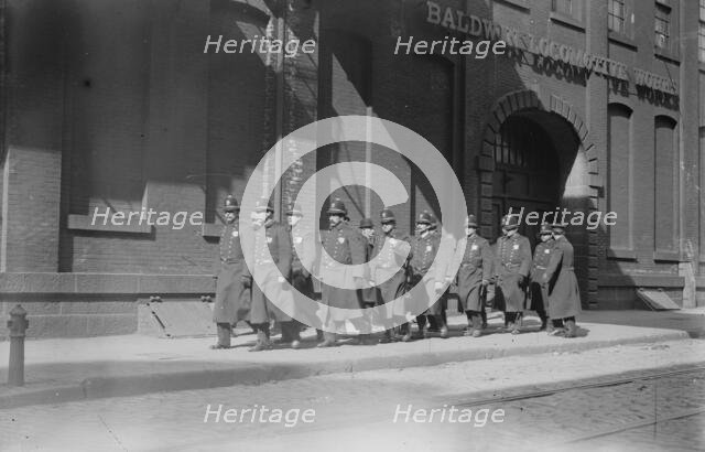 Police patrol marching outside Baldwin Locomotive Works, Philadelphia, 1910. Creator: Bain News Service.