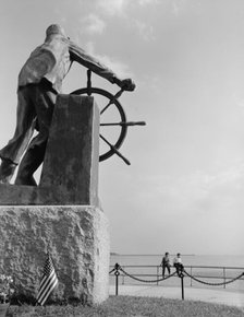 The bronze fisherman, a memorial to men lost at sea, Gloucester, Massachusetts, 1943. Creator: Gordon Parks.