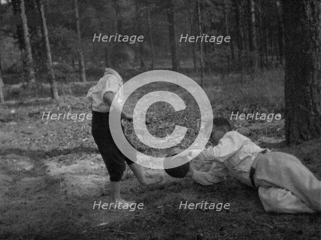Dmitri Shostakovich plays football with his son Maxim in Komarovo, 1947. Creator: Varzar Shostakovich, Nina Vasilyevna (1909-1954).