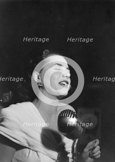 Portrait of Ann Hathaway, Café Society (Downtown), New York, N.Y., 1946. Creator: William Paul Gottlieb.