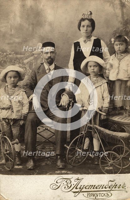 Tatar family of an employee of the office of Irkutsk merchants Shafigulins G.M. Muratov..., 1915. Creator: N. Z. Lustenberg.