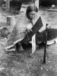 Preparing cedar bark-Nakoaktok, c1914. Creator: Edward Sheriff Curtis.