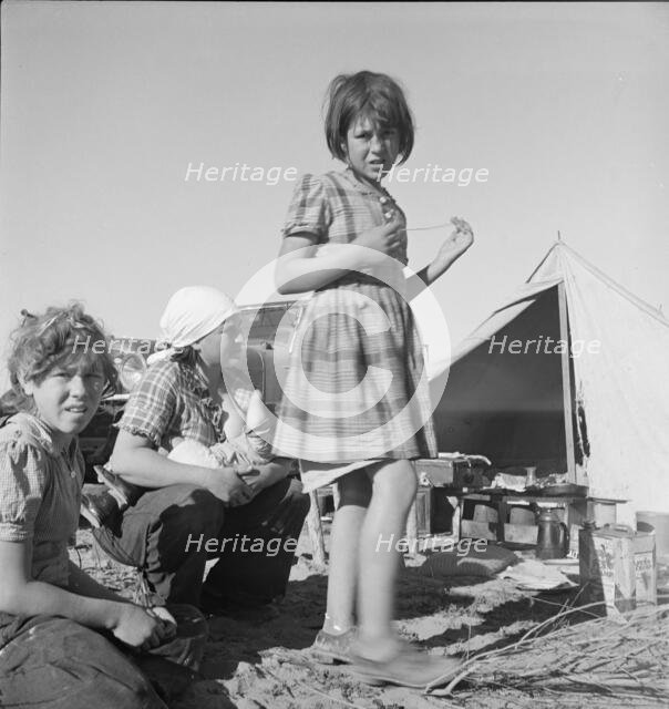 Part of family arrived the night before...near Holtville, Imperial Valley, California, 1939. Creator: Dorothea Lange.