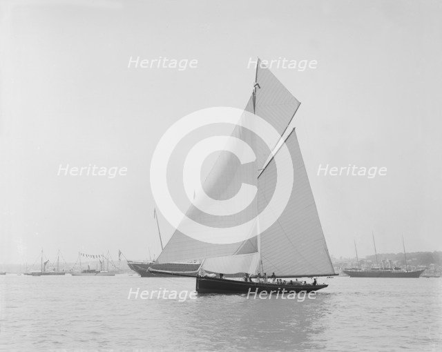 The gaff rigged cutter 'Bloodhound' sailing in light winds, 1908. Creator: Kirk & Sons of Cowes.