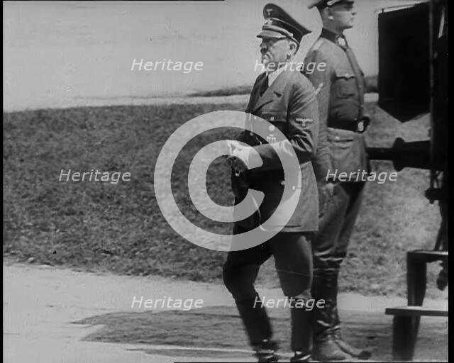 Adolf Hitler Walking Away from the 1918 Armistice Train Car at  Compiegne After the French..., 1940. Creator: British Pathe Ltd.