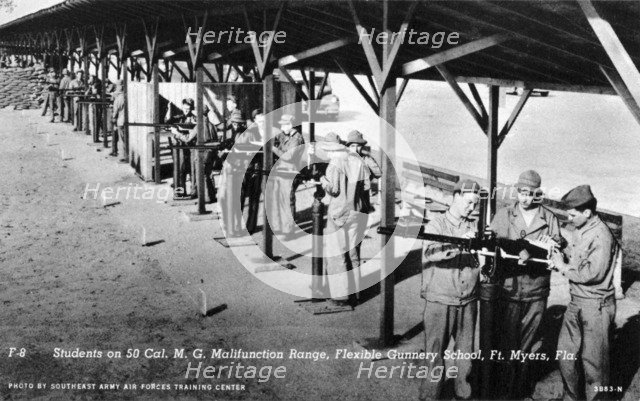 Students on a 50 cal machine gun range, Flexible Gunnery School, Fort Myers, Florida, USA, 1943. Artist: Southeast Army Air Forces Training Center