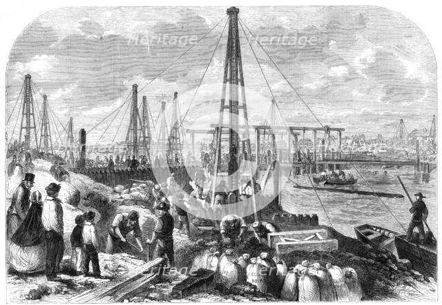 The Flood in the Fens: making the cofferdam, 1862. Creator: Unknown.