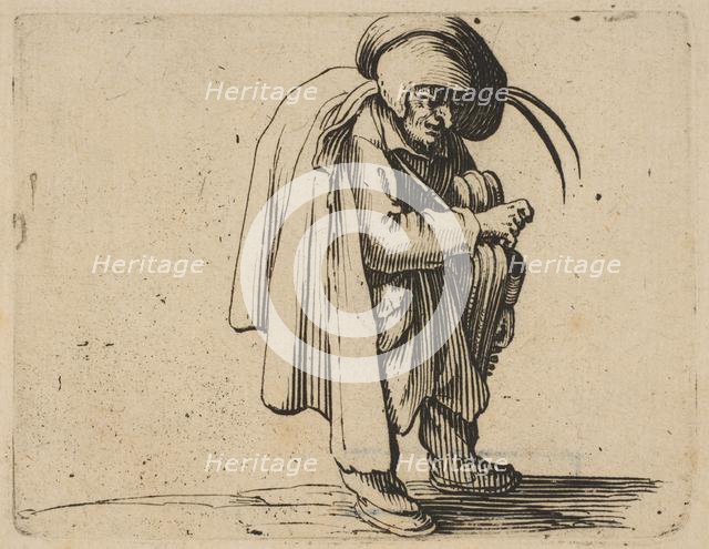 Le Jouer de Vielle (The Hurdy-Gurdy Player), from Varie Figure Gobbi, suite appelée aus..., 1616-22. Creator: Jacques Callot.