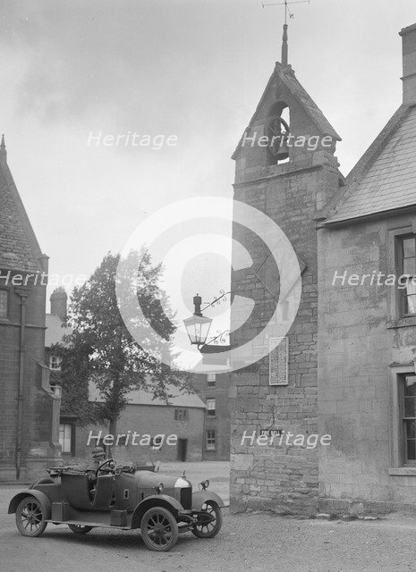 Morris Bullnose outside the fire station, Chipping Norton, Oxfordshire, 1920s. Artist: Bill Brunell.