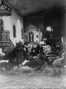 Poor in North France sleeping in church, between 1914 and c1915. Creator: Bain News Service.