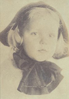 Young girl with a hat tied with a large bow, head-and-shoulders portrait, facing front, c1900. Creator: Eva Watson-Schutze.