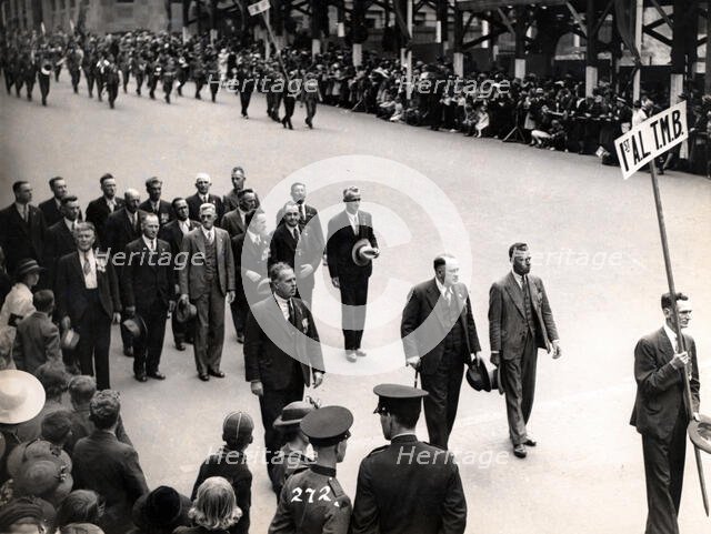 Capt Frank Page MC (with walking stick), Anzac Day march, year unknown. Creator: Unknown.