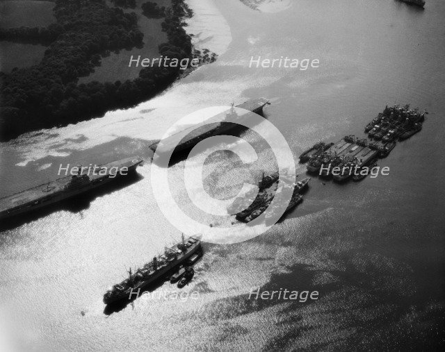 Royal Navy aircraft carriers and other military ships on the River Tamar, Plymouth, Devon, 1959. Artist: Harold Wingham.