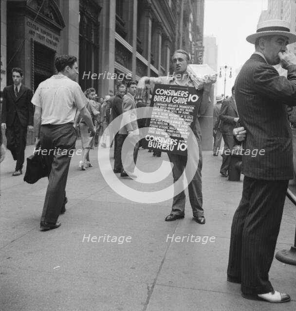 Street hawker selling Consumer's..., 42nd Street and Madison Avenue, New York City, 1939. Creator: Dorothea Lange.
