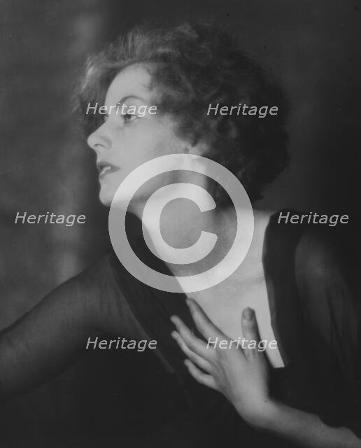 Portrait photograph of Greta Garbo, 1925 July. Creator: Arnold Genthe.