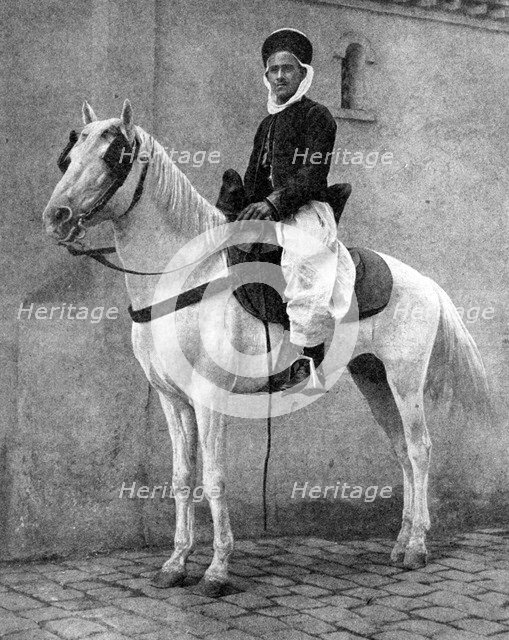 Berber horseman of the French Army, 1936.Artist: Donald McLeish