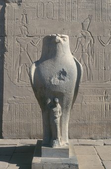 Giant statue of the Ancient Egyptian falcon-headed god Horus, Edfu, Egypt. Artist: Unknown