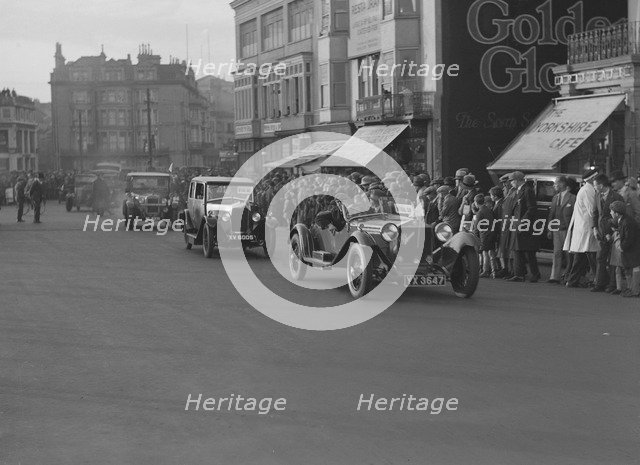 Alfa Romeo and Riley taking part in the London-Brighton Run, 1928. Artist: Bill Brunell.
