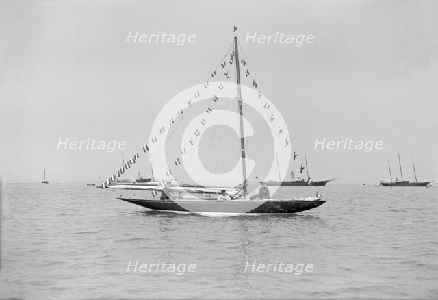 The 6 Metre 'Cremona' moored with flags, 1913. Creator: Kirk & Sons of Cowes.