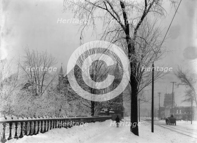 Church and Grand River Avenue in snow, Detroit, Mich., between 1900 and 1905. Creator: Unknown.