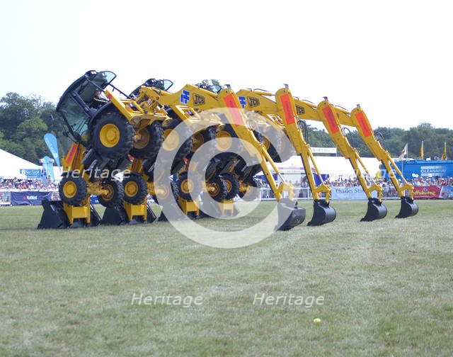 Stunt JCB diggers perfoming formation "dance" routine at New Forest show 2006. Creator: Unknown.