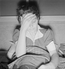 Sick woman awaits visit of the doctor, FSA camp, Merill, Klamath County, Oregon, 1939. Creator: Dorothea Lange.