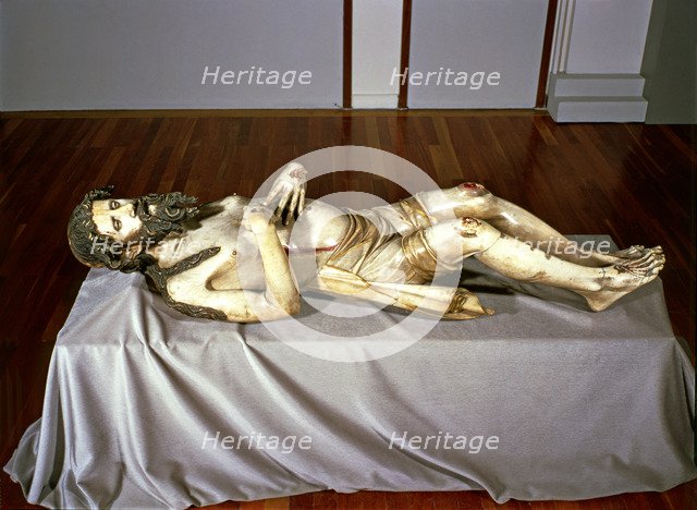 Christ lying in a St. Sepulchre, made in 1350 in alabaster, preserved in the church of Sant Feliu…