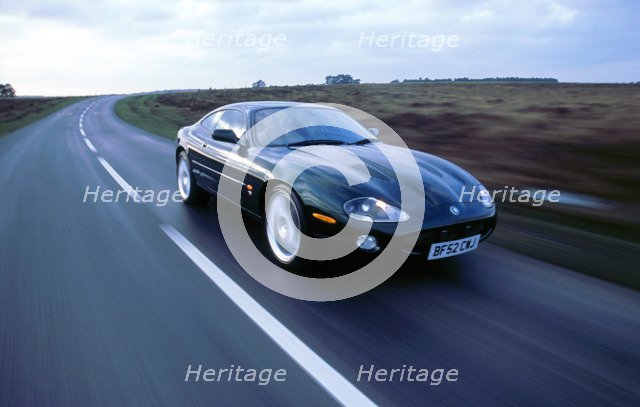 2002 Jaguar XKR coupe. Artist: Unknown.