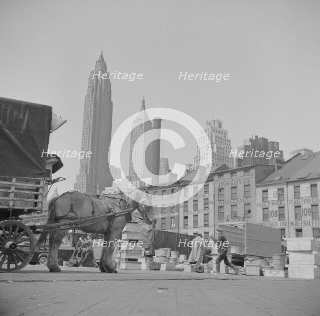 A scene at the Fulton fish market, New York, 1943. Creator: Gordon Parks.