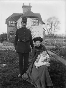 A group portrait of a policeman and his family, Warwickshire, 1905. Artist: A Newton