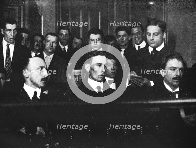 Robert Fay (on the left) and his two accomplices photographed in court ', 1915.  Artist: Unknown.