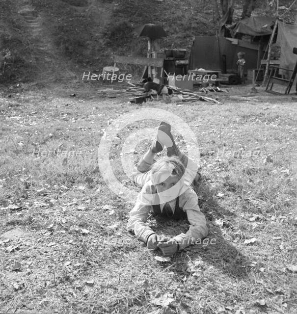 Boy, fourteen, in eighth grade, American River camp, near Sacramento, California, 1936. Creator: Dorothea Lange.