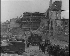 Lorries Carrying Spanish Nationalist Soldiers Loyal To Franco Through Madrid Past the..., 1939. Creator: British Pathe Ltd.