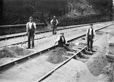 Railway tracklayers at work, Bodmin Road Station, Cornwall, 1901. Artist: Alfred Newton & Sons.
